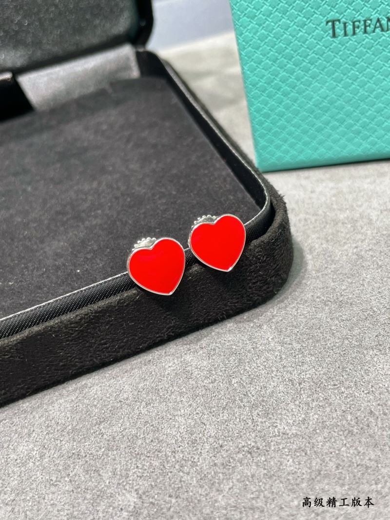 T*f*ny earrings